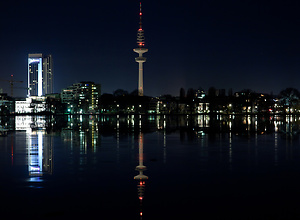 Photograph shows the water of the outer Alster with fascinating reflections.