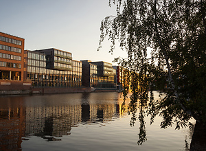 Charming water reflections at late hour in Hamburg Dulsberg.