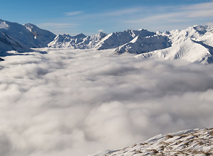 Sea of clouds in a mountain landscape in winter.