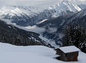 View of a snow hut in the mountains in Austria.