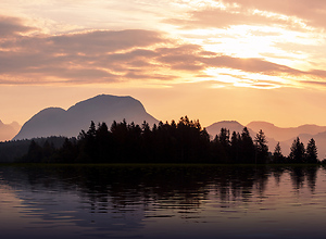 Reddish sunrise shows the misty morning dawn.
