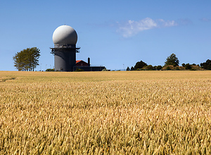 Weather station in front of golden wheat fields
